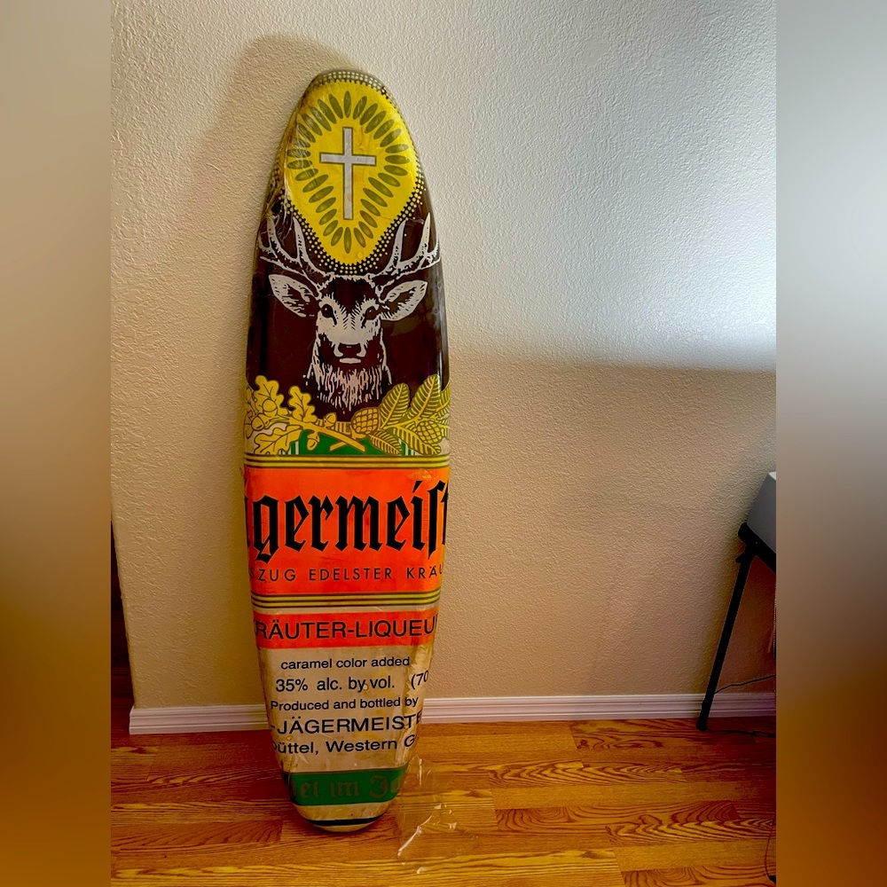 Antique advertisement surfboard display
